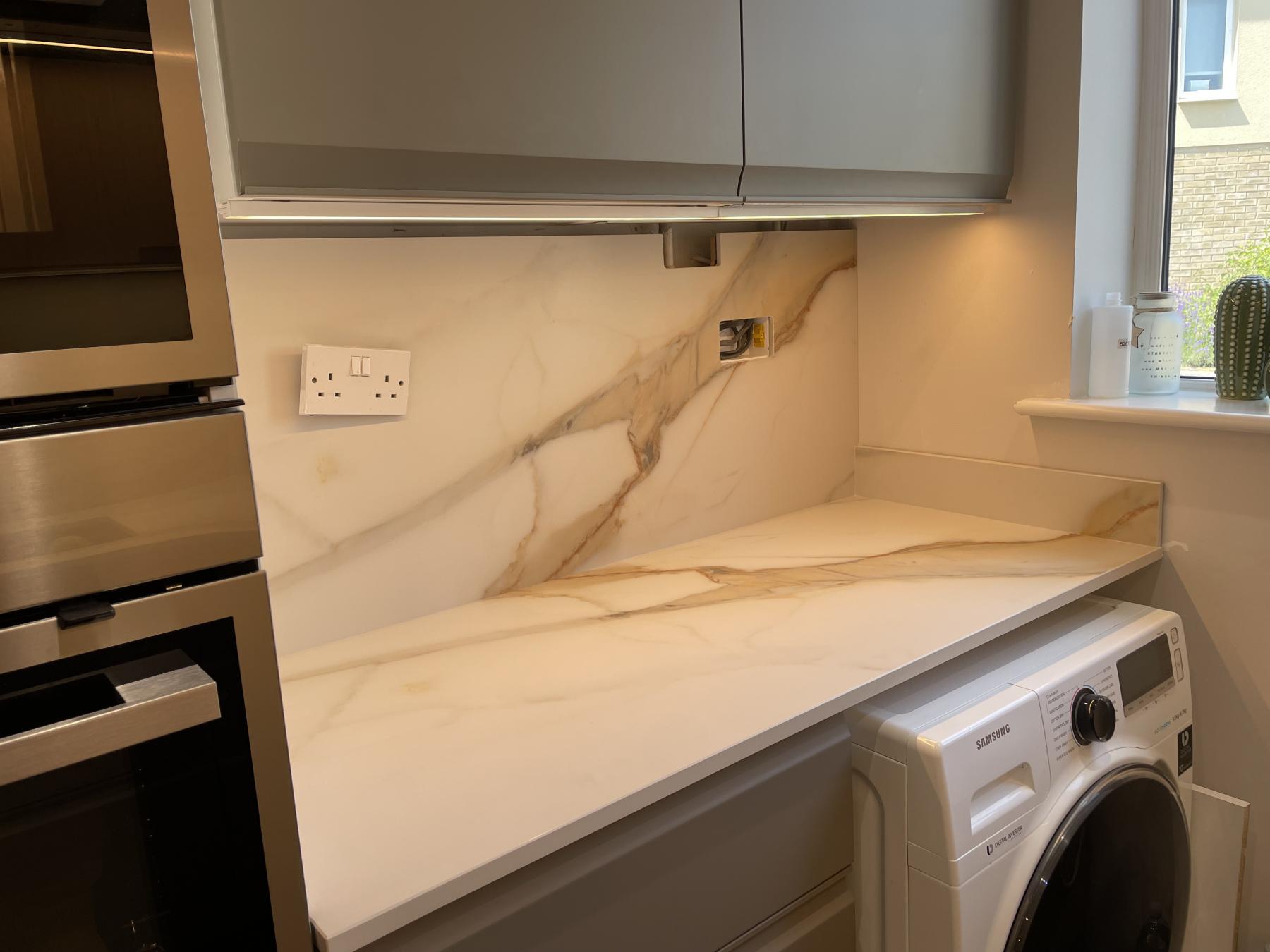Marvel Gold bockmach Splashback and worktop Project: ST.Neotts Polish and matt