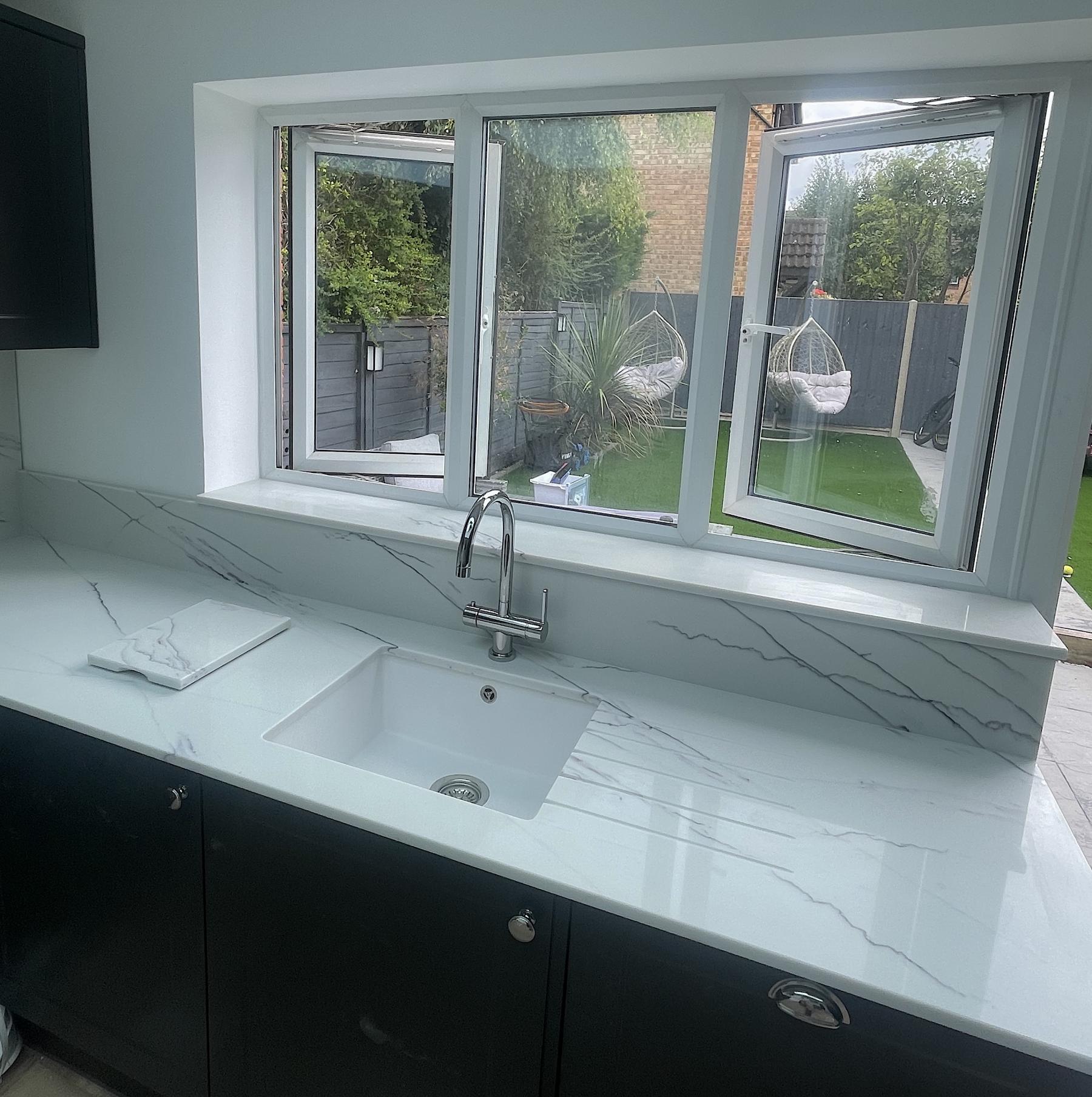 Calacatta Blush undermounted sink and window sill. Project: Shefford polished