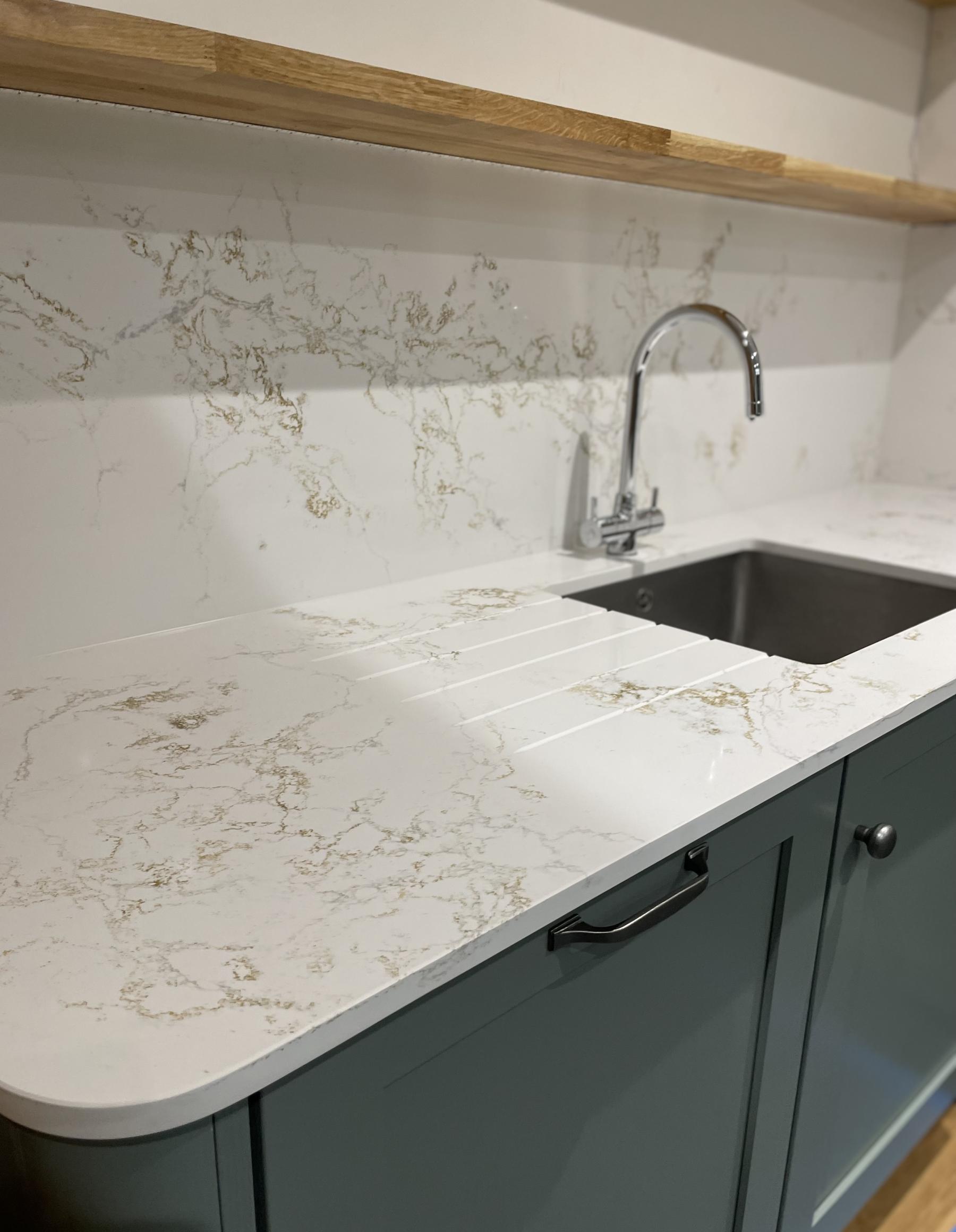 Nebulous Gold undercount sink with full Splashback Project Willian Created by Arik Levy for Compac