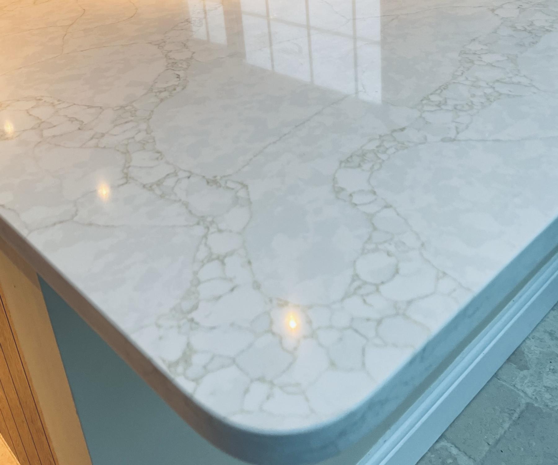 Statuario Gold radius corner with chamfered edge 