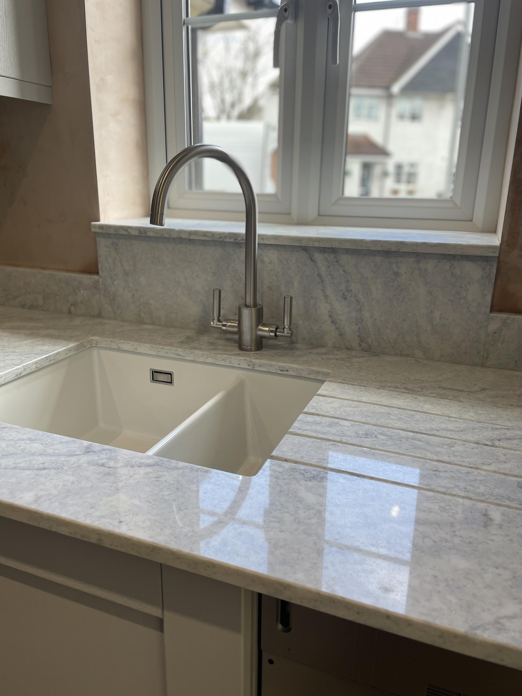 Pacific Blue undermounted sink and drainers grooves Project: Letchworth polished