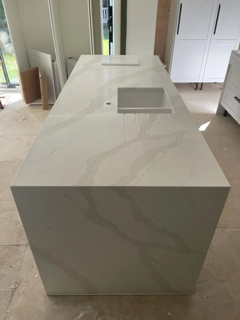 Statuario Oro bookmatch waterfalls Project: Cottered polished, bookmatch