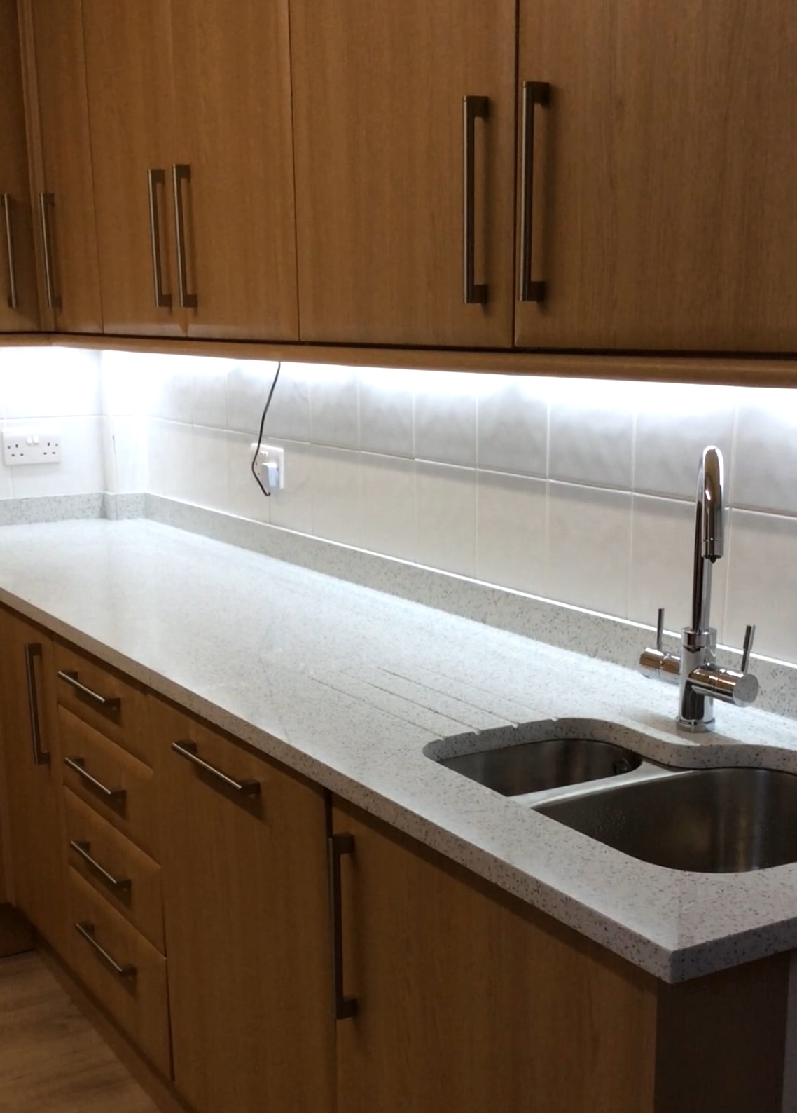 Glitter Branco worktop with shaped undermounted sink 
