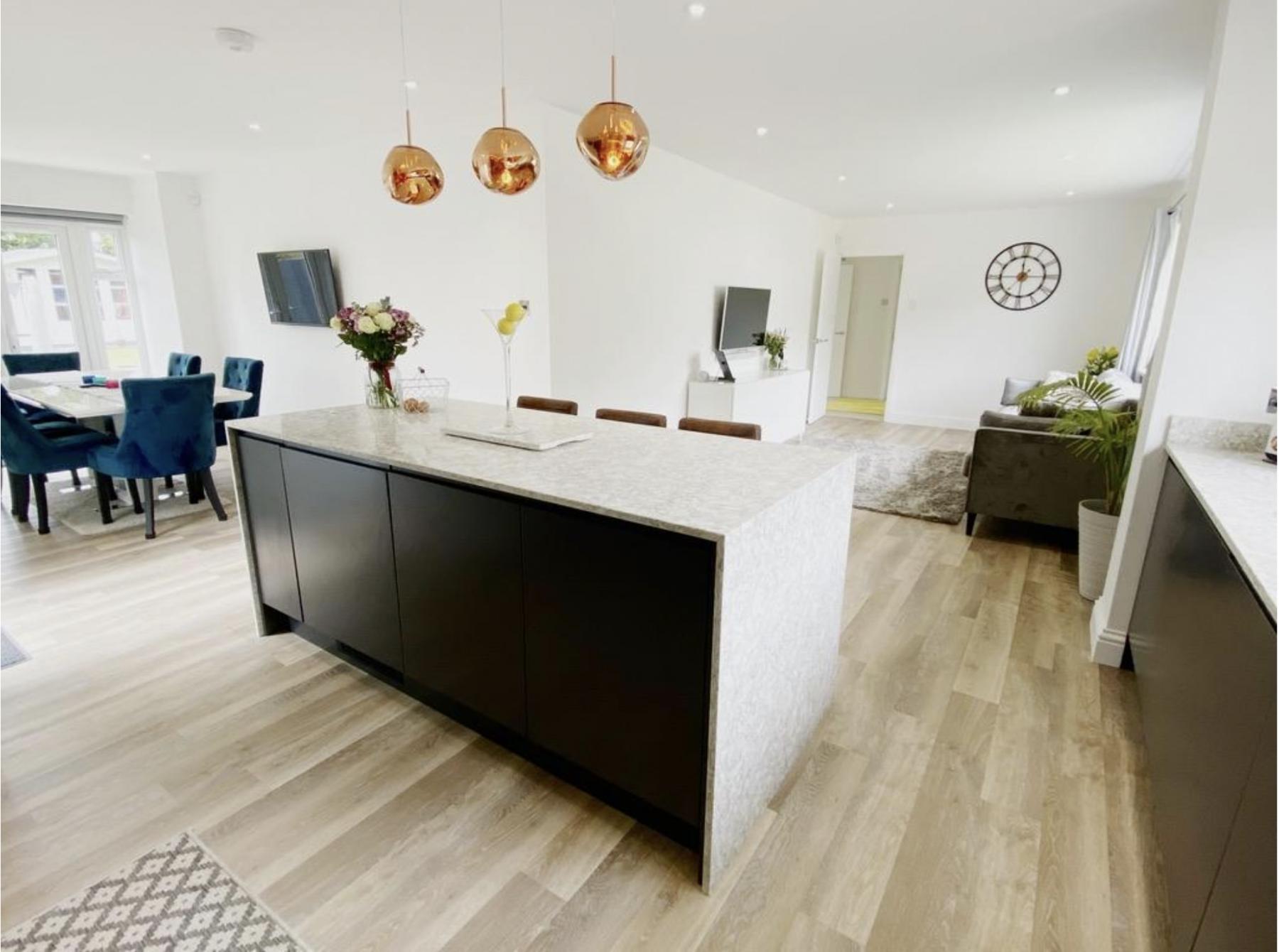 The Waterfall Edge: Why This Design Trend is the Ultimate Kitchen Statement Why this seamless architectural feature is the ultimate long-term investment for modern islands and compact kitchens alike.