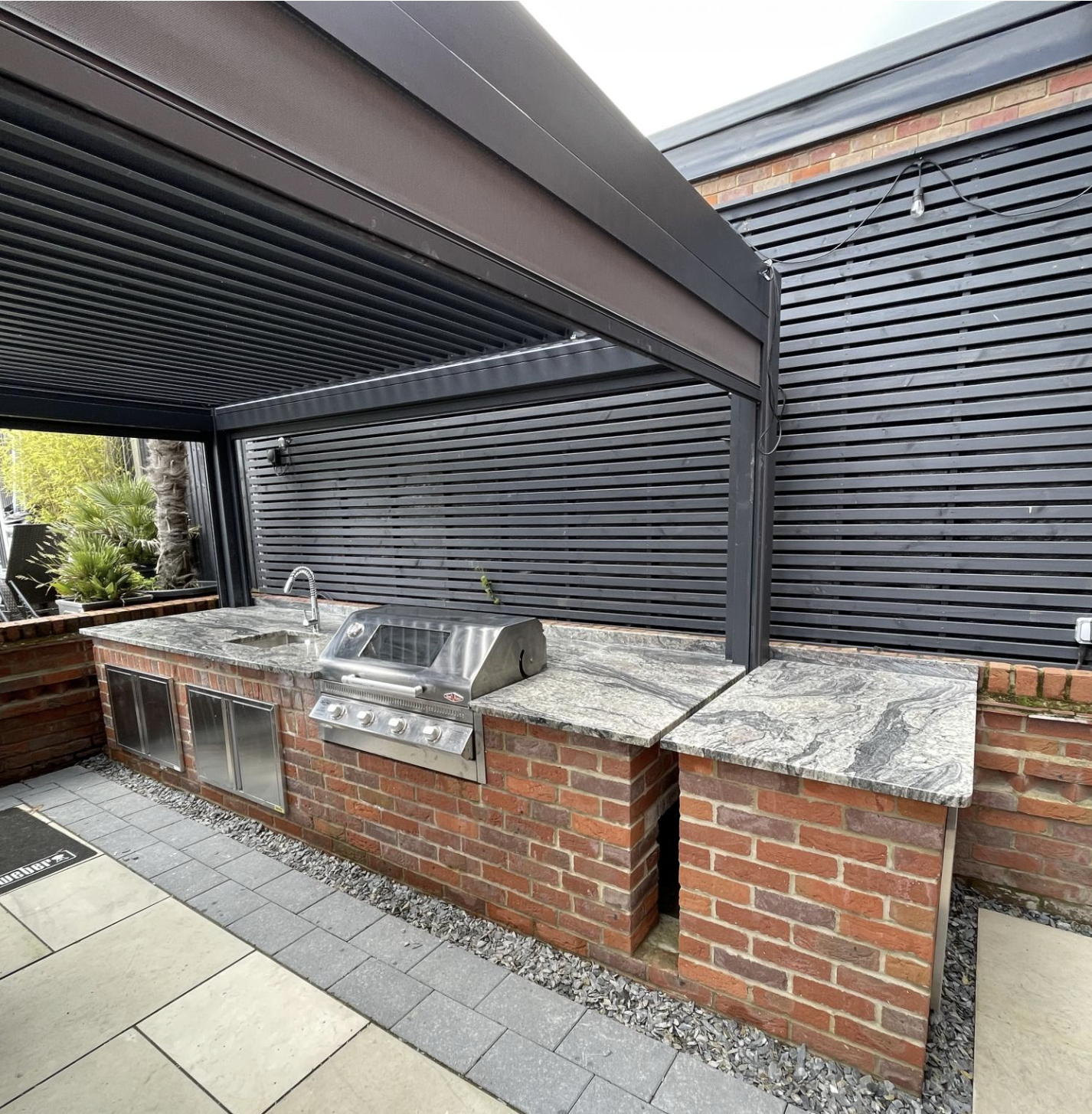How To Transform Your Garden into a Luxury Outdoor Kitchen Oasis How to choose a weather-proof, luxury stone surface that creates a seamless flow from your home to your garden.