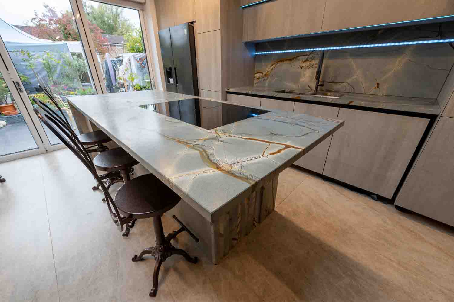 Blue Roma Island with L-hsapped breakfast bar leather and polished