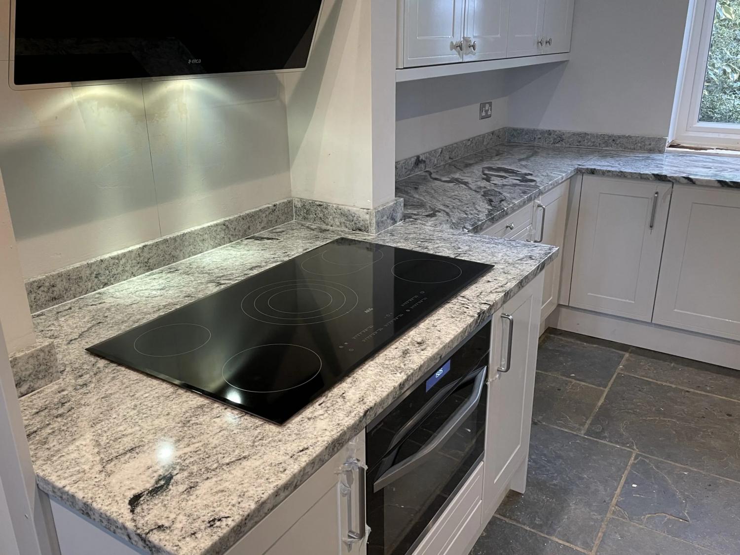Cosmic White project:  - Worktops and Islands Gallery -  Home Smart Systems